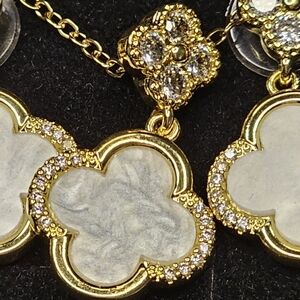 Elegant Gold and White Clover Necklace